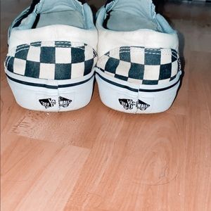 Checkerboard slip on vans